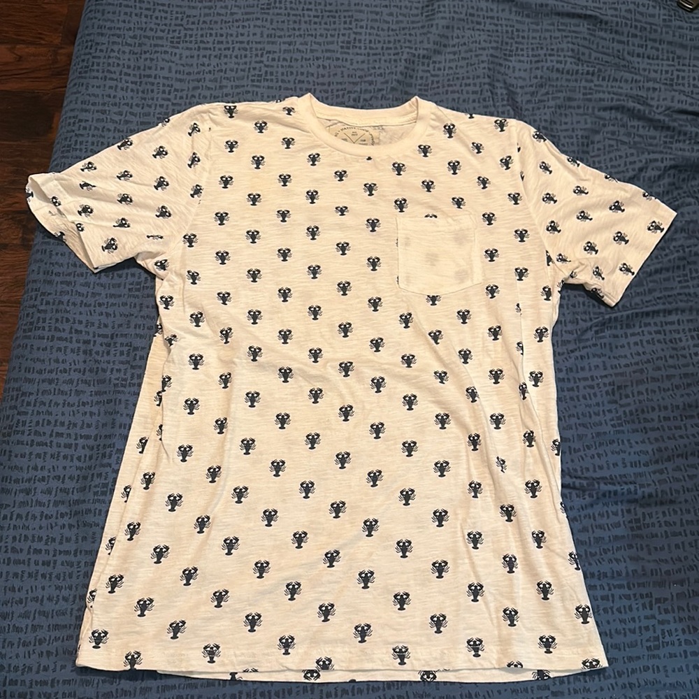 White and navy shirts with a front pocket